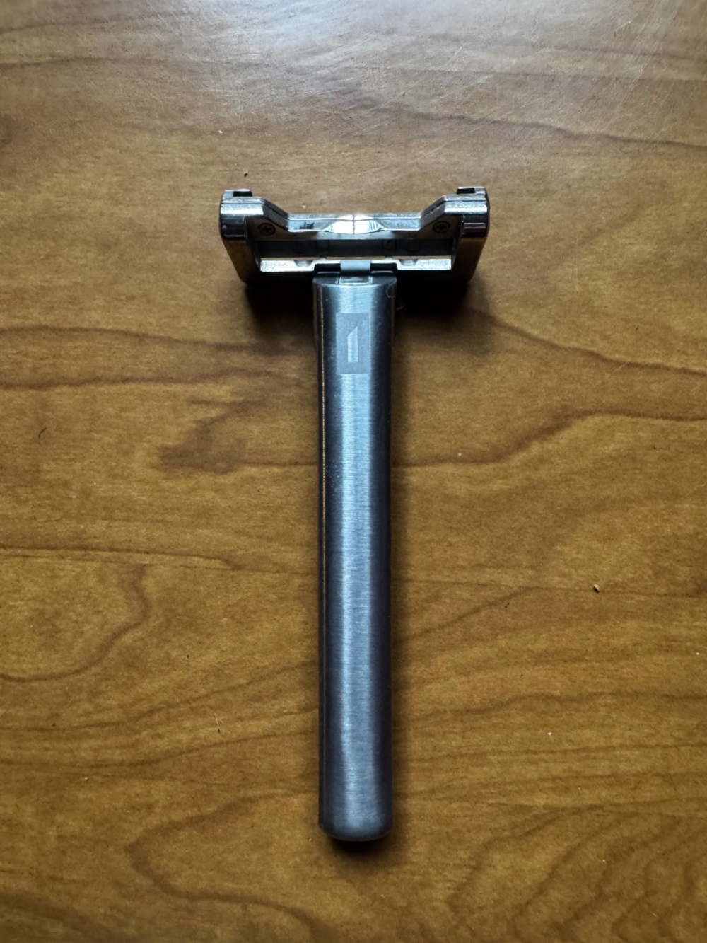 OneBlade razor with leather case, metal stand, and blades